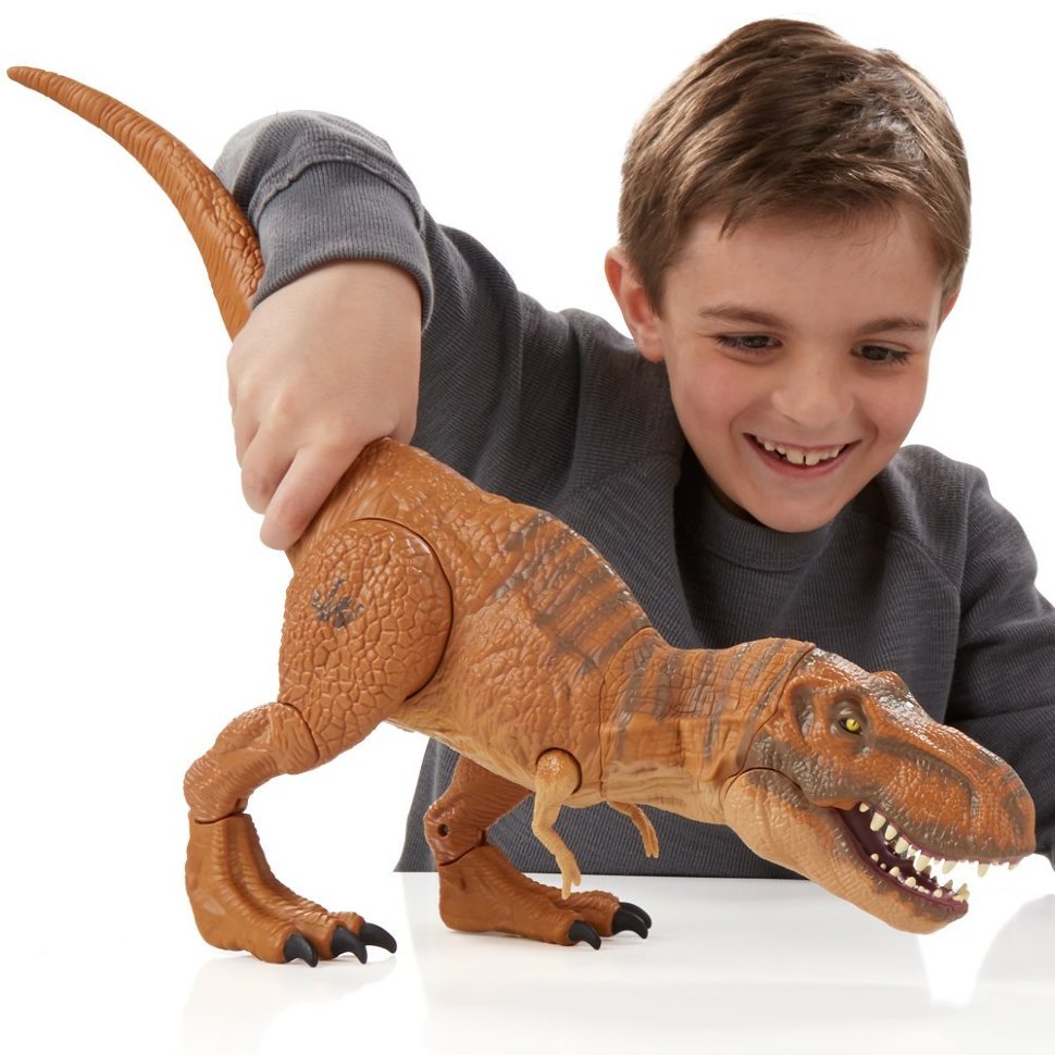 Мир динозавров игрушка. Игрушка Jurassic World t-Rex. Игрушка Tyrannosaurus Rex детский мир. Игрушки парк Юрского периода Тираннозавр. Тираннозавр рекс игрушка мир Юрского периода.