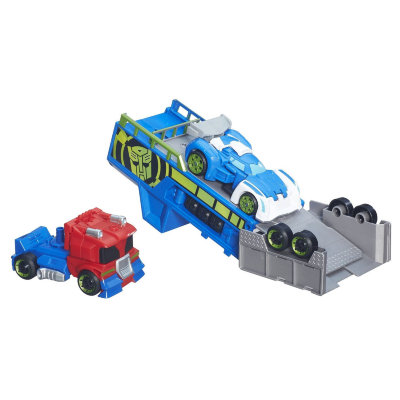 Игровой набор 'Гоночный трейлер Оптимуса Прайма' (Optimus Prime Racing Trailer), из серии Transformers Rescue Bots (Боты-Спасатели), Playskool Heroes, Hasbro [B5584] Игровой набор 'Гоночный трейлер Оптимуса Прайма' (Optimus Prime Racing Trailer), из серии Transformers Rescue Bots (Боты-Спасатели), Playskool Heroes, Hasbro [B5584]